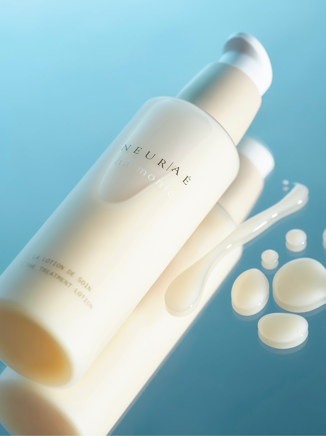 harmonie lotion packshot with droplets